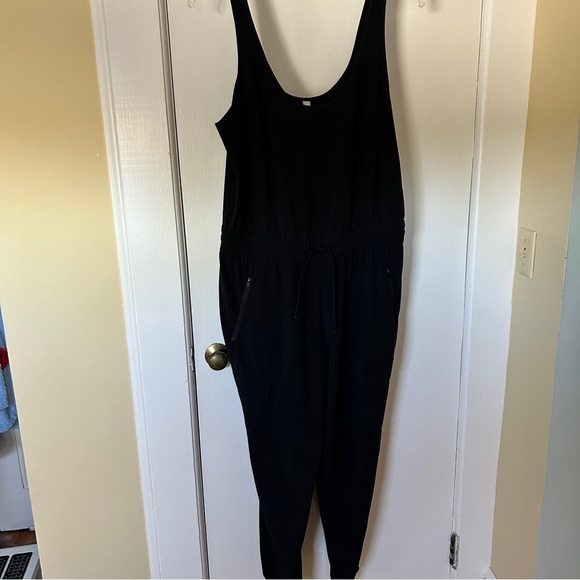 Athleta Unbound Black Jumpsuit Sleeveless Drawstring Waist Pockets size Large - Picture 6 of 15
